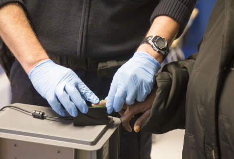 Refugees are registered and recorded by the Federal Police in Rosenheim. A Federal Police officer