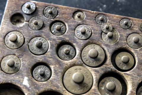 Weights for a pharmacist's precision balance in the historic Berg Pharmacy in Clausthal-Zellerfeld.