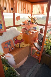 Orange colour theme decorated bus shelter, Haroldswick, Unst, Shetland Islands, Scotland, United