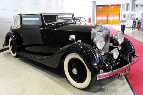 RETRO CLASSICS 2010, Stuttgart Messe, Side view of a black Rolls-Royce convertible, symbolising