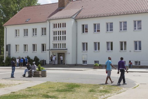 Refugees at the central contact point for asylum seekers in the state of Brandenburg in