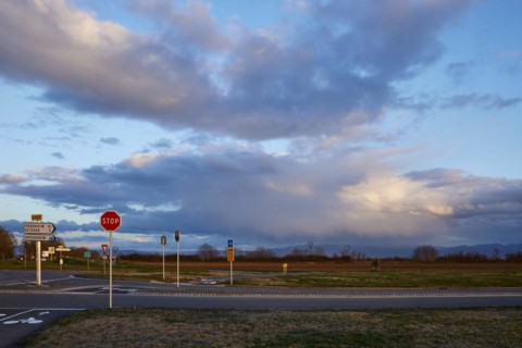 Weather change with mighty light to grey-blue clouds illuminated by the evening sun over the Black