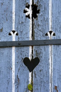 Wooden door with heart, stable door, light-coloured varnish, weathered, leaves of knotweed