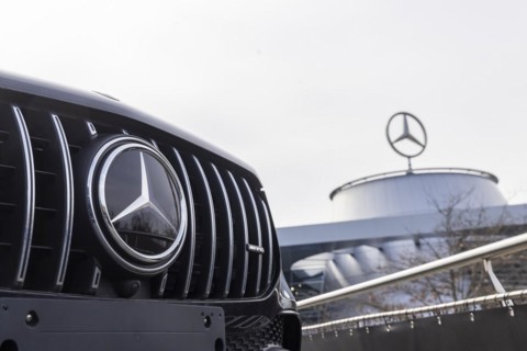 Mercedes, radiator grille and Mercedes star on a modern vehicle, in the background the Mercedes