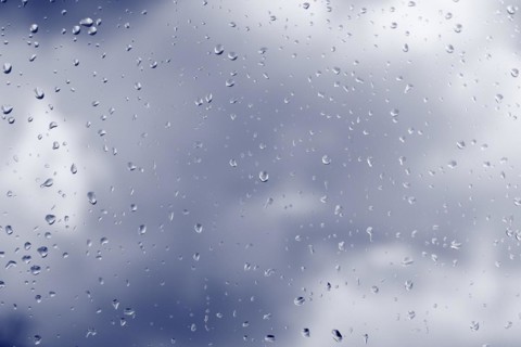 Raindrops on a window pane, North Rhine-Westphalia, Germany, Europe