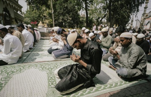 Muslim devotees offer the first Friday prayers of the holy month of Ramadan at a Mosque, on March