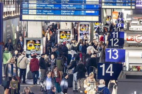 Central station, travellers in the platform hall. Extensive construction work on the railway