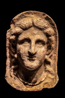 Female votive head, 3rd - 2nd century, a.C., Archaeological Museum, Castello di Udine, seat of the