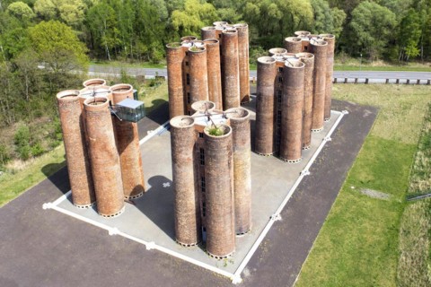 An aerial photo shows 24 brick towers rising 22 metres into the sky above Lauchhammer. They are the