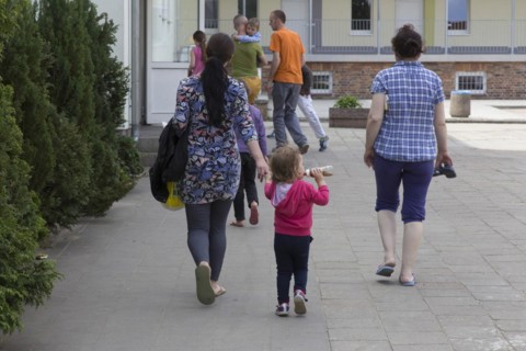 Refugees at the central contact point for asylum seekers in Brandenburg, Eisenhuettenstadt, 3 June