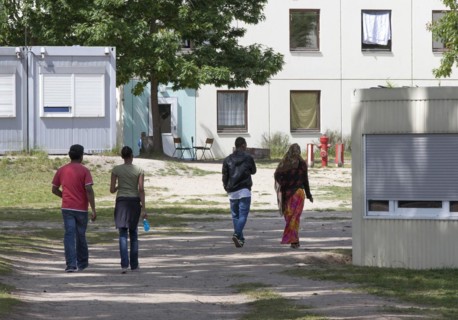 Refugees at the central contact point for asylum seekers in the state of Brandenburg in