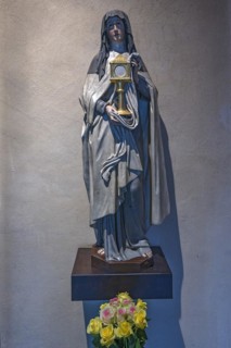 Sculpture by Caritas Pirckheimer at the entrance to St Mary's Chapel, St Clare's Church,