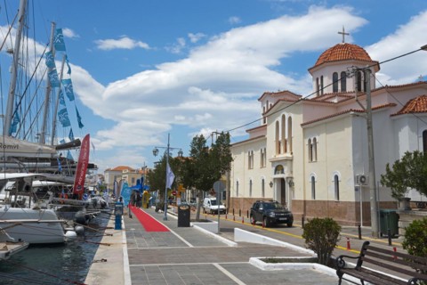 A picturesque harbour view with a church, yachts and a promenade under a blue sky, Promenade, Holy