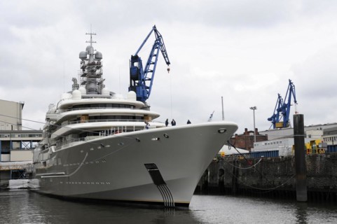 A large white luxury yacht moored in the harbour on a cloudy day, Hamburg, Hanseatic City of
