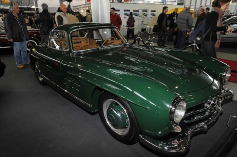 RETRO CLASSICS 2010, Stuttgart Messe, Side view of a green Jaguar E-Type classic car at a trade