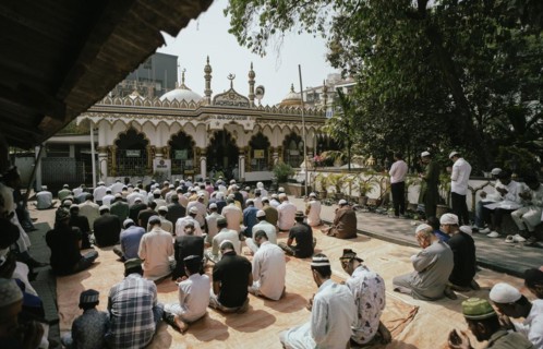 Muslim devotees offer the first Friday prayers of the holy month of Ramadan at a Mosque, on March