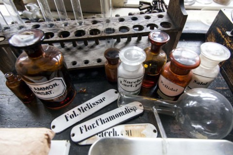 Glass jars for the production of medicines stand in the former laboratory in the historic Berg