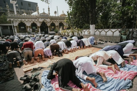 Muslim devotees offer the first Friday prayers of the holy month of Ramadan at a Mosque, on March