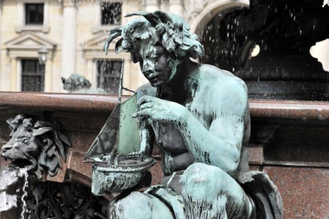 Close-up of a copper allegorical sculpture at a public fountain, Hamburg, Hanseatic City of