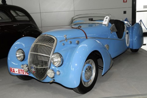 RETRO CLASSICS 2010, Stuttgart Messe, A striking blue convertible classic car with white stripes