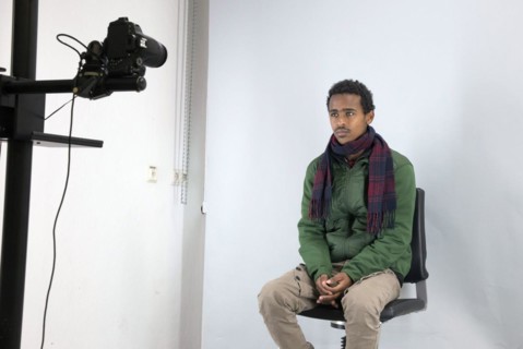A fugitive is photographed at the Federal Police in Passau during the identification procedure,