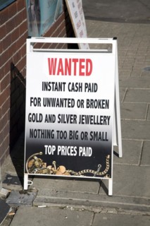 Sign offering to buy unwanted or broken gold, silver jewellery, England, UK