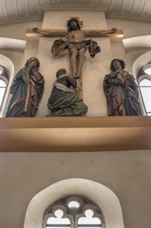 Placed on the west wall is the monumental crucifixion group from around 1510 by the carver Veit