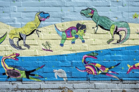 Animals of prehistoric times on water and land, ichthyosaurs, dinosaurs, colourful illustration,