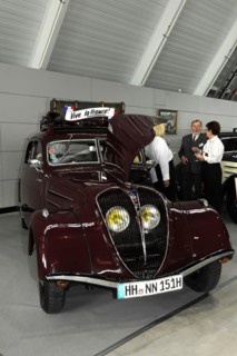 RETRO CLASSICS 2010, Stuttgart Messe, A well-kept dark red classic vintage car with open bonnet and