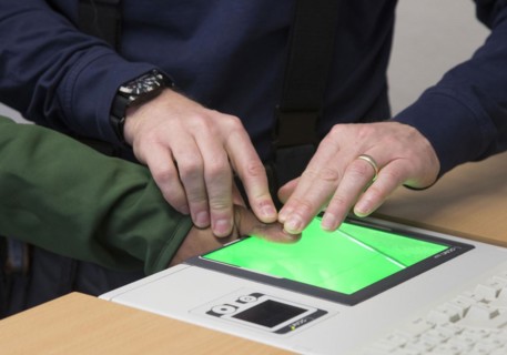 A refugee is registered and recorded by the Federal Police in Rosenheim, 05/02/2016