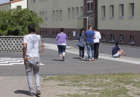 Refugees at the central contact point for asylum seekers in the state of Brandenburg in