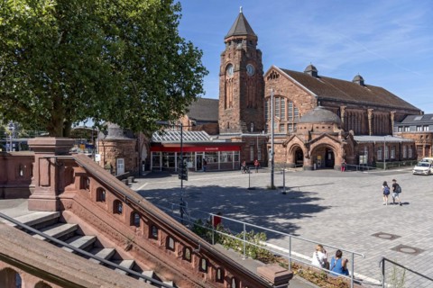Historic Wilhelmine railway station, staircase to the station square, clock tower, reception