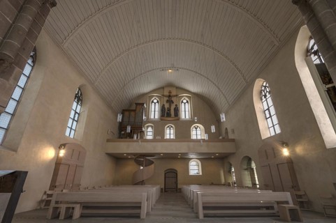 Interior with view to the west side with gallery and crucifixion group, St Clare's Church,