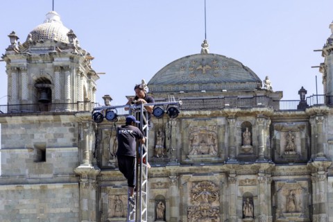 Oaxaca, Mexico, Workers set up lighting for youth boxing matches in front of the Metropolitan