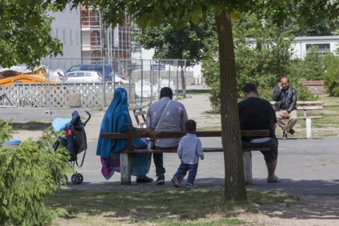 Refugees at the central contact point for asylum seekers in the state of Brandenburg in