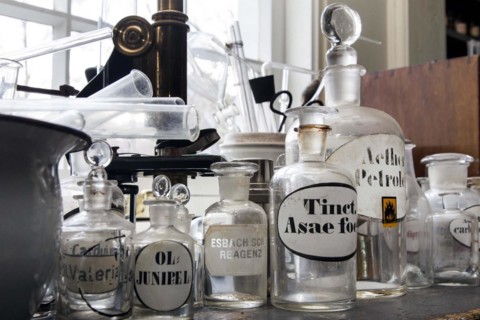 Glass jars for the production of medicines stand in the former laboratory in the historic Berg