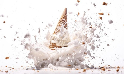 Ice cream cone explosion on white background AI generated