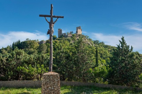View from the old village mill Moulin Saint Roche to the ruins of Grimaud Castle, Grimaud-Village,