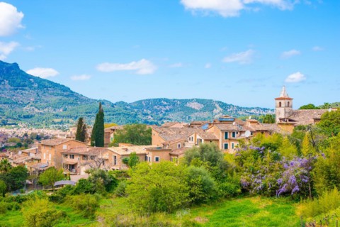 Southern village of Biniaraix with small church, houses, buildings, view towards Soller, rural