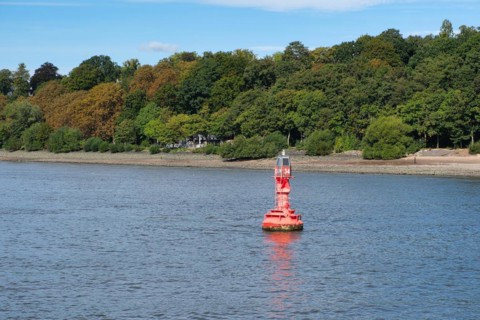 View over the Elbe beach in Hamburg harbour with buoy, Hanseatic City of Hamburg, Hamburg, Germany,