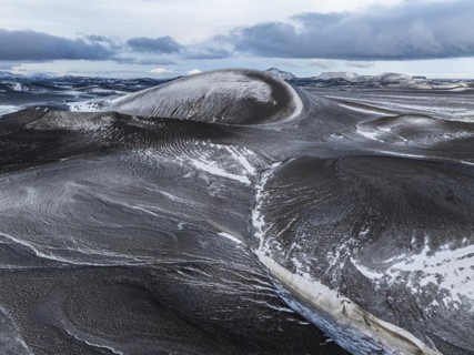 Overgrown river landscape and volcanic landscape, drone shot, Fjallabak Nature Reserve, Sudurland,