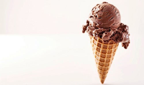 Chocolate ice cream cone on white background AI generated