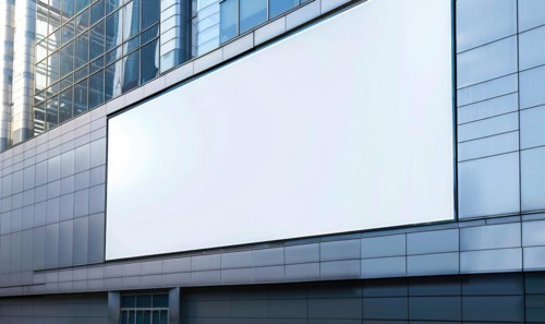 Blank screen banner mockup displayed on the modern building facade. Close Up view AI generated