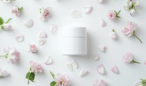 Creme jar blank mockup surrounded by delicate flower petals AI generated