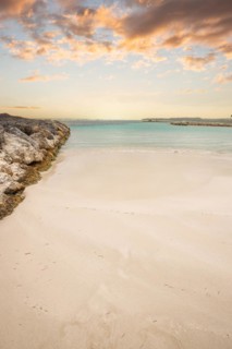 Caribbean dream beach with palm trees, white sandy beach and turquoise-coloured, crystal-clear