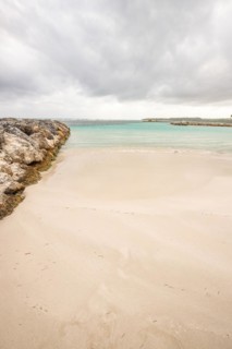 Caribbean dream beach with palm trees, white sandy beach and turquoise-coloured, crystal-clear