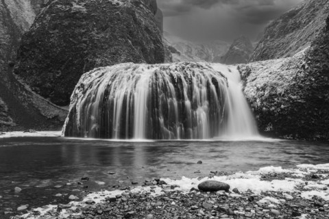 Stjornarfoss waterfall, near Kirkjubaejarklaustur, black and white photo, Sudurland, Iceland,