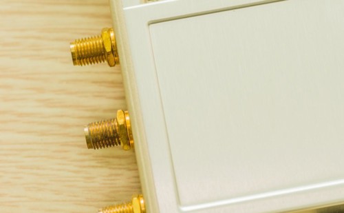 Gold-plated antenna ports on beige technology hardware, in South Korea