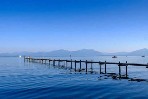 Lake Chiemsee with mountains from Hotel Malerwinkel, Chiemgau, Upper Bavaria, Bavaria, Germany,