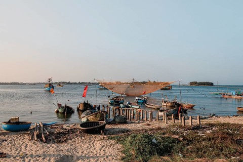 Scenic view of traditional Vietnamese fishing boats in Phan Thiet fishing village in Mui Ne,